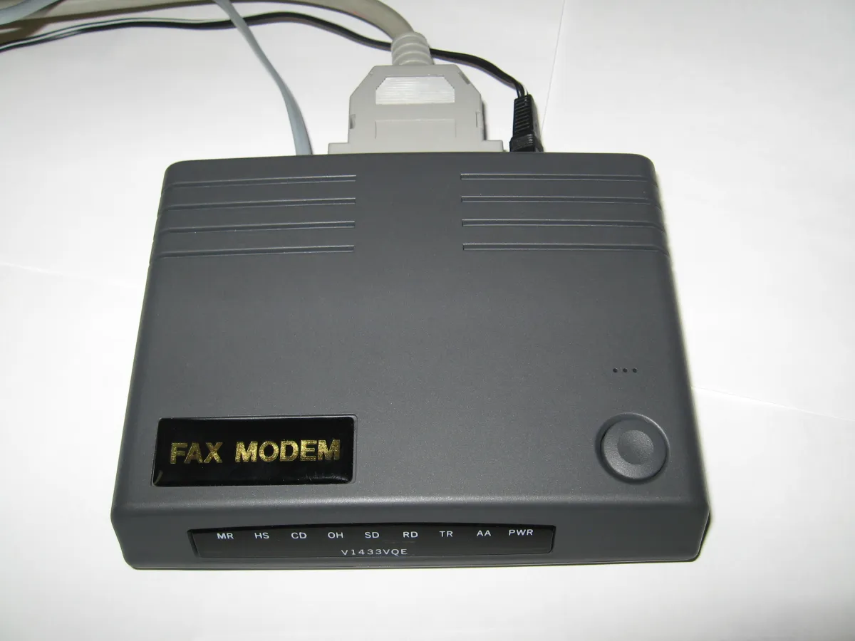 Внешний dial-up модем 33.6k